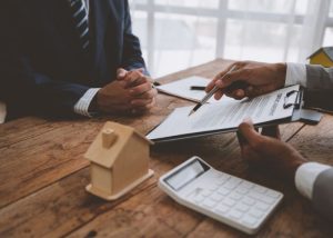 Guarantor rental contract being signed